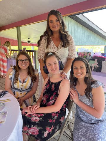 <p>Sarah Crichigno</p> Hope Crichigno (center) at Haley Johnson's bridal shower in 2021