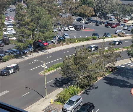 Officials are seen following a possible shooting at the headquarters of YouTube, in San Bruno, California, U.S., April 3, 2018 in this picture obtained from social media. GRAEME MACDONALD/via REUTERS