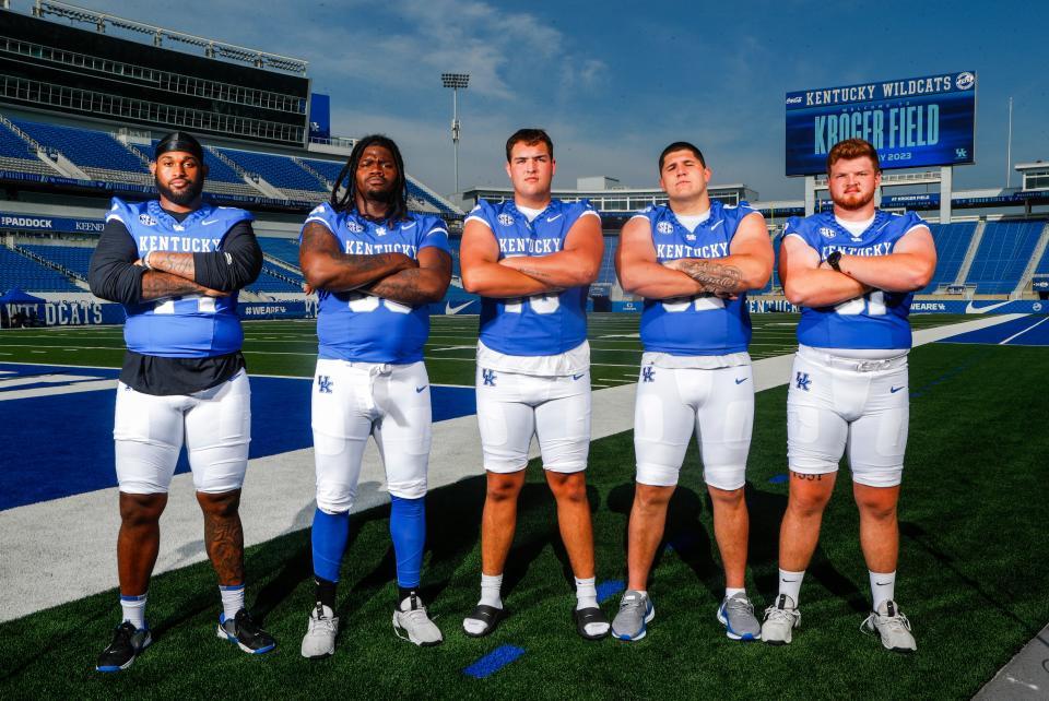 UK's offensive line stands for a picture at 2023 Media Day at Kroger Field in Lexington for Kentucky football.  Aug. 4, 2023