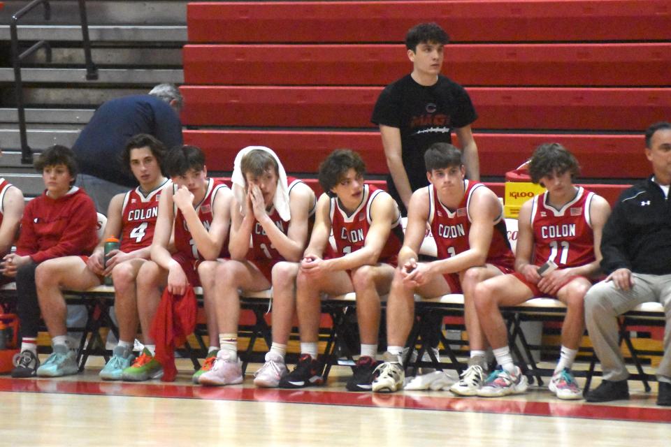 Members of the Colon Magi look on as the Kalamazoo Phoenix Fury receive their Division Four Regional Championship Wednesday night