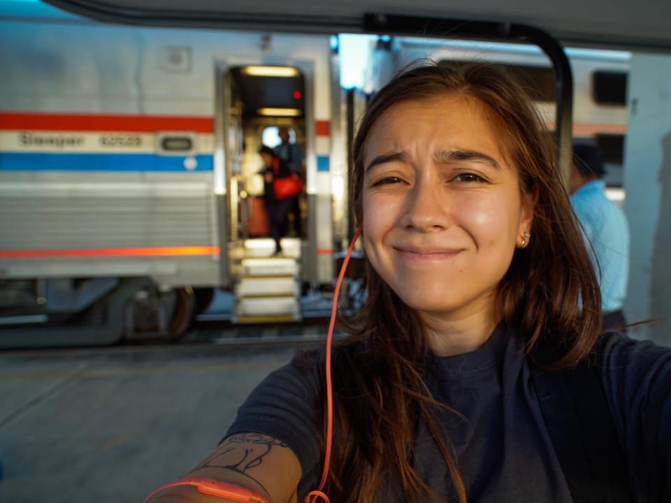 The author exits a train in Miami after a 30-hour ride.