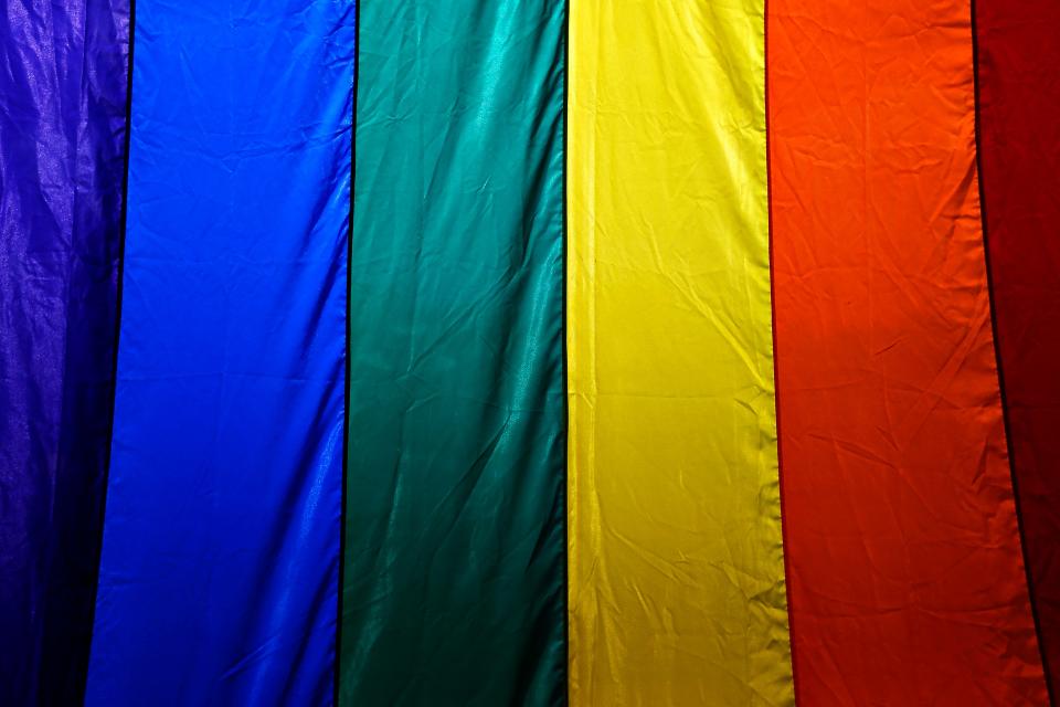 Detail of a giant Pride flag hanging during the 2016 Greater Ozarks Pridefest at Park Central Square in Springfield, Mo. on June 17, 2016.