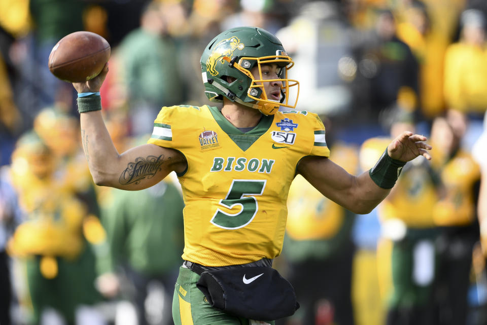 Trey Lance of the North Dakota State Bison looks to pass the ball against James Madison during the Division I FCS Football Championship on Jan. 11, 2020. (Justin Tafoya/NCAA Photos via Getty Images)