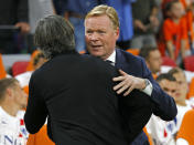 Germany's head coach Joachim Loew, left, embraces Netherland's head coach Ronald Koeman prior the UEFA Nations League soccer match between The Netherlands and Germany at the Johan Cruyff ArenA in Amsterdam, Saturday, Oct. 13, 2018. (AP Photo/Peter Dejong)