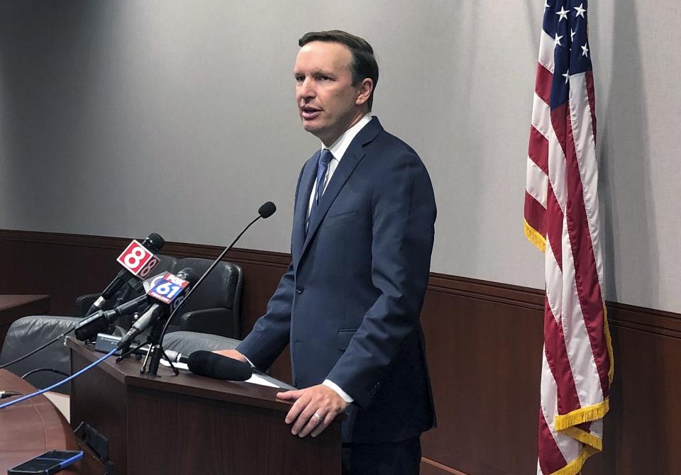 U.S. Sen. Chris Murphy speaks during a news conference, Friday, Aug. 23, 2019, in Hartford, Conn. Murphy said White House officials told him on Thursday that President Donald Trump remains committed to working on expanded background checks legislation for gun purchases. (AP Photo/Susan Haigh)