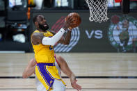 Los Angeles Lakers' LeBron James shoots against the Toronto Raptors during the first half of an NBA basketball game Saturday, Aug. 1, 2020, in Lake Buena Vista, Fla. (AP Photo/Ashley Landis, Pool)