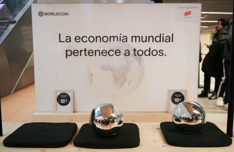 WorldCoin's iris-scanners are displayed in a stall of Madrid
