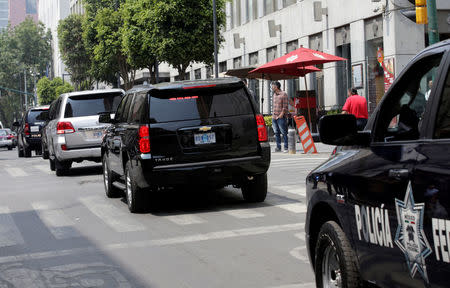 Police guard a convoy of cars, including one transporting Jared Kushner, senior adviser to U.S. President Donald Trump, after a visit at Mexico's Ministry of Foreign Affairs in Mexico City, Mexico March 7, 2018. REUTERS/Henry Romero