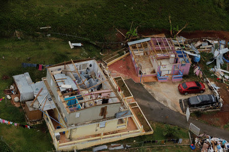 The contents of a damaged home can be seen as recovery efforts continue following Hurricane Maria near the town of Comerio, Puerto Rico, October 7, 2017. REUTERS/Lucas Jackson