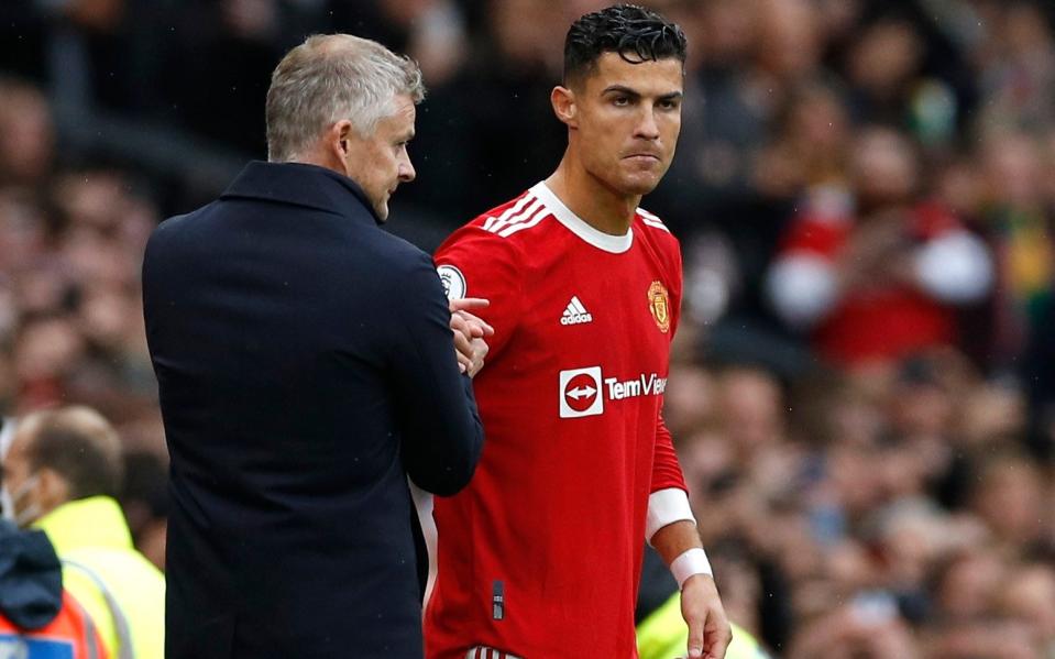 Ole Gunnar Solskjaer (left) and Cristiano Ronaldo (right) have both been criticised - REUTERS