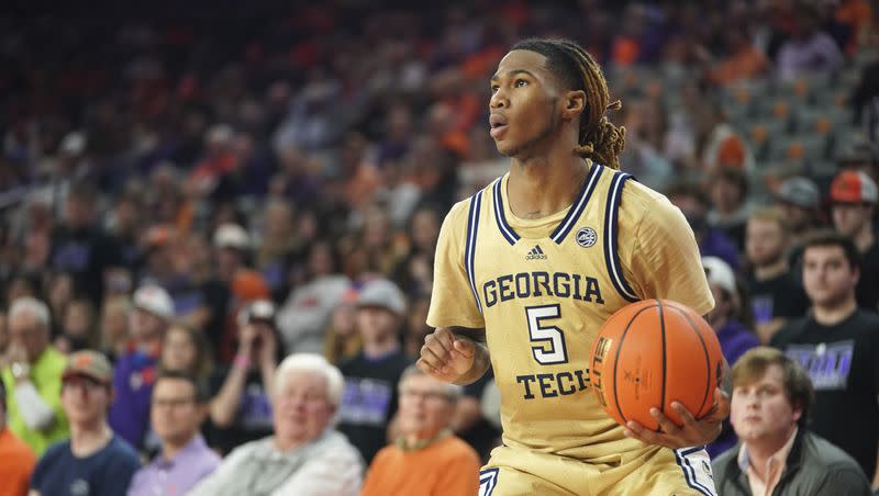 Georgia Tech guard Deivon Smith surveys the defense during an NCAA college basketball game against Clemson Tuesday, Jan. 24, 2023, in Clemson, S.C. Smith announced Friday he is transferring to Utah.