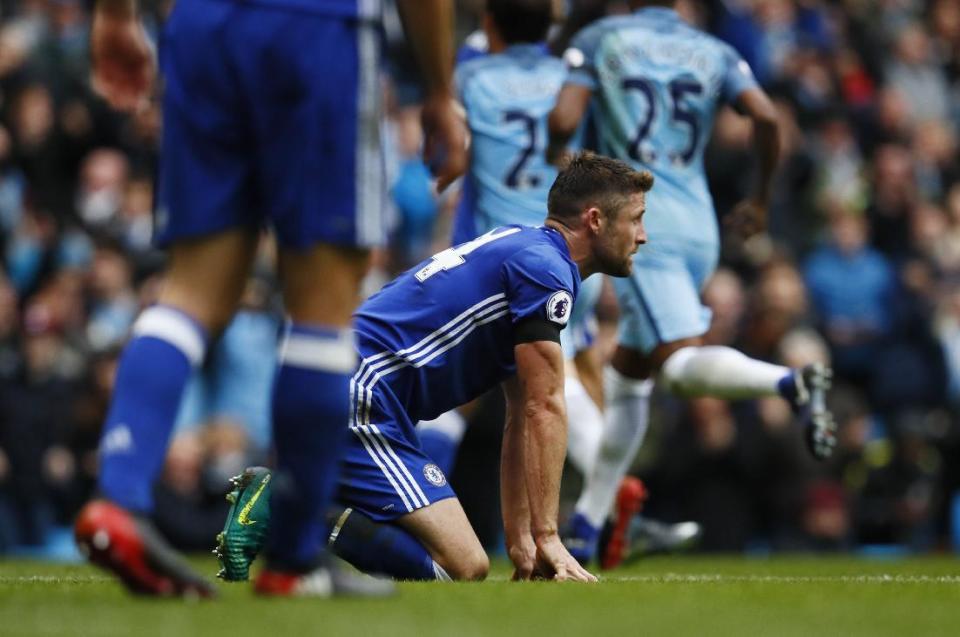 Britain Football Soccer - Manchester City v Chelsea - Premier League - Etihad Stadium - 3/12/16 Chelsea's Gary Cahill looks dejected after scoring an own goal and the first goal for Manchester City Action Images via Reuters / Jason Cairnduff Livepic EDITORIAL USE ONLY. No use with unauthorized audio, video, data, fixture lists, club/league logos or "live" services. Online in-match use limited to 45 images, no video emulation. No use in betting, games or single club/league/player publications. Please contact your account representative for further details.