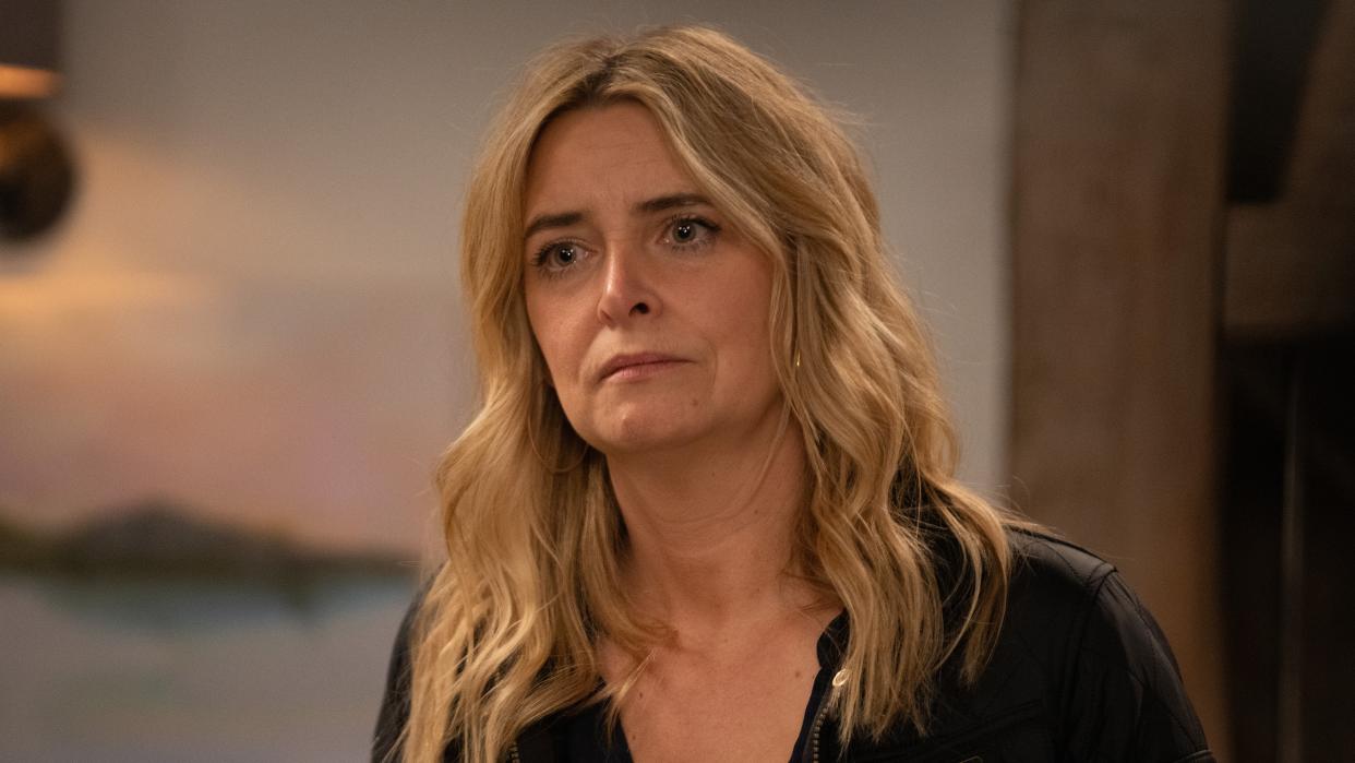  Emmerdale Charity Dingle looking sad wearing a black top and her hair down. 