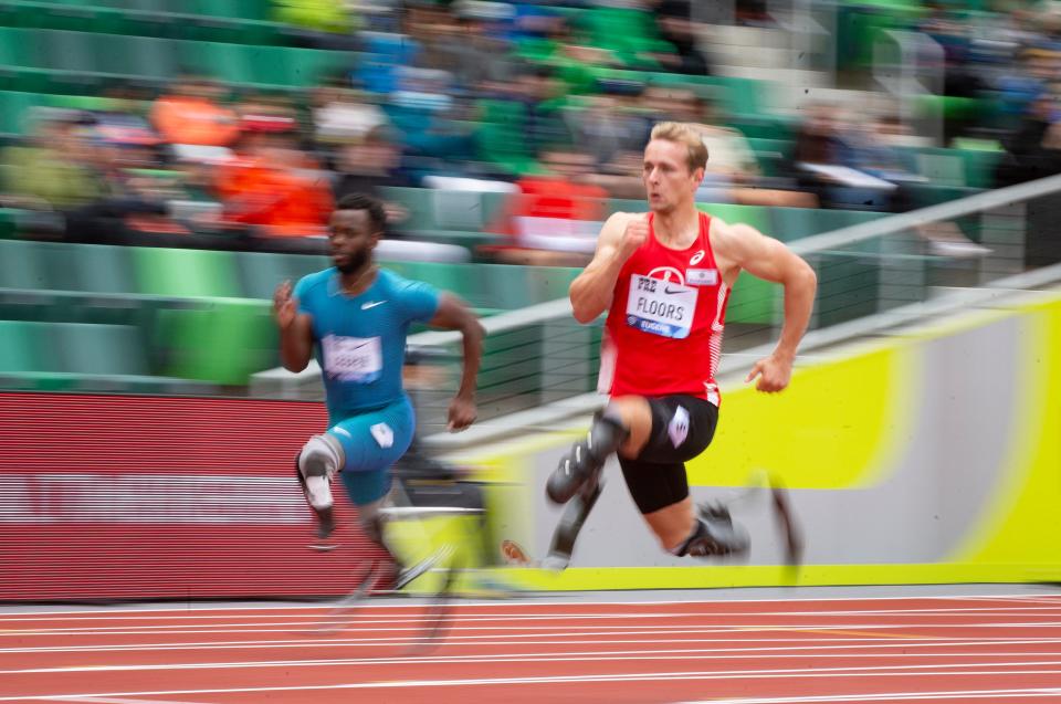 Johannes Floors rounds the first bend on his way to winning the men’s 100 meter T62 at the annual Prefontaine Classic at Hayward Field Saturday, May 28, 2022, in Eugene, Oregon. 