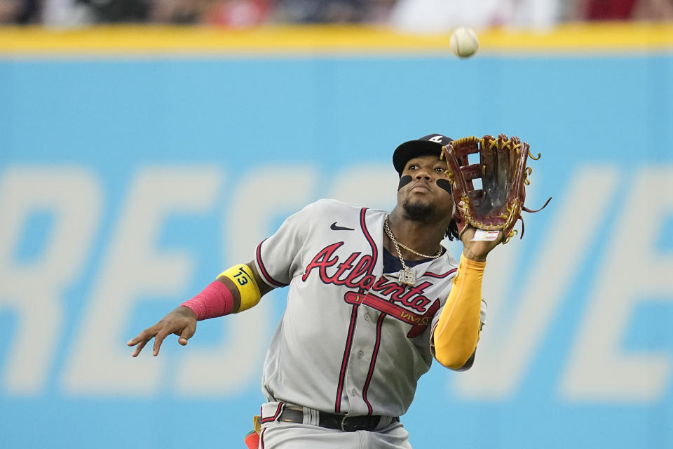 Atlanta Braves right fielder Ronald Acuna Jr. catches a fly ball hit hit by Cleveland Guardians' Josh Bell during the fifth inning of a baseball game Wednesday, July 5, 2023, in Cleveland. (AP Photo/Sue Ogrocki)