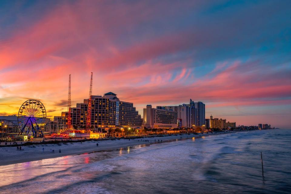 colorful sunset above daytona beach, florida