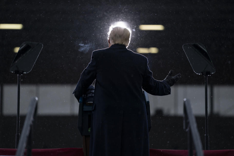 President Donald Trump speaks during a campaign rally at Capital Region International Airport, Tuesday, Oct. 27, 2020, in Lansing, Mich. (AP Photo/Evan Vucci)