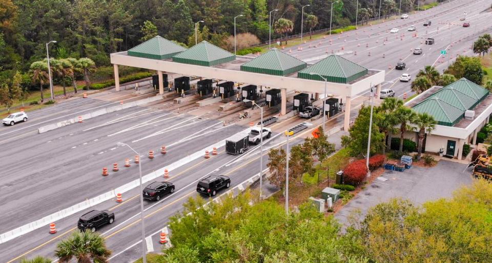 Traffic barrels and barriers direct drivers on the Cross Island Parkway to the outside lanes — as seen in this drone photo taken on Thursday, March 30, 2022 — as workers prepare to remove the parkway’s toll booths on Hilton Head Island. Previous reporting noted that as part of the project, demolition, construction and new signage stretching from U.S. 278 Business to the Charles E. Fraser Bridge should be finished by year’s end.