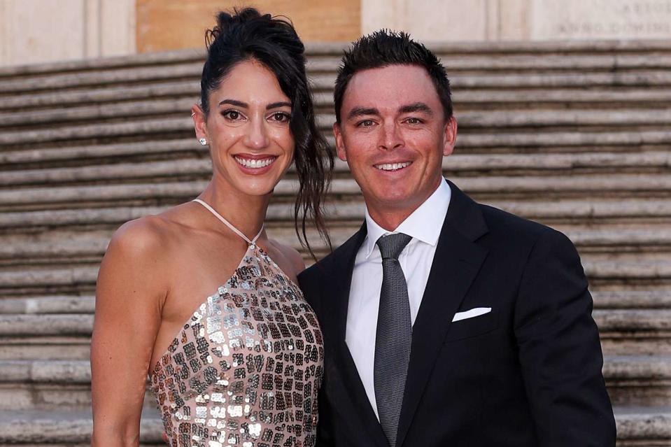 <p>Richard Heathcote/Getty</p> Rickie Fowler and Allison Stokke