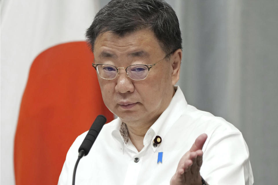 Japan’s Chief Cabinet Secretary Hirokazu Matsuno speaks at a press conference in Tokyo Tuesday, June 6, 2023. Japan’s government has adopted a revision to the country’s plans to use more hydrogen as fuel, setting an ambitious target to spend $107 billion and increase the annual supply by six times from the current level to 12 million tons by 2040.(Kyodo News via AP)