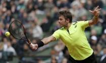 Switzerland's Stan Wawrinka returns the ball. French Open - Roland Garros. Switzerland's Stan Wawrinka vs Czech Republic's Lukas Rosol Paris, France - 23/05/16. REUTERS/Gonzalo Fuentes