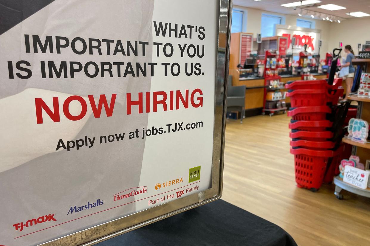 A Now Hiring sign at T.J. Maxx in Annapolis, Maryland, on May 16, 2022. (Photo by Jim WATSON / AFP) (Photo by JIM WATSON/AFP via Getty Images)