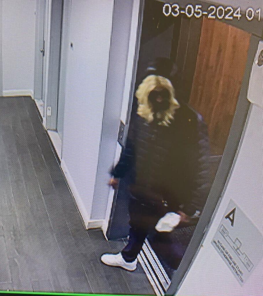 Johnson allegedly in the apartment building while wearing a blond wig. Obtained by NY Post