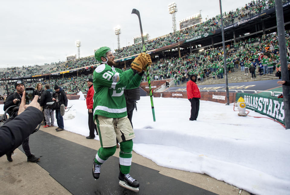 Dallas Stars center Tyler Seguin (91) acknowledges the crowd after the NHL Winter Classic hockey game against the Nashville Predators at the Cotton Bowl, Wednesday, Jan. 1, 2020, in Dallas. Dallas won 4-2. (AP Photo/Jeffrey McWhorter)