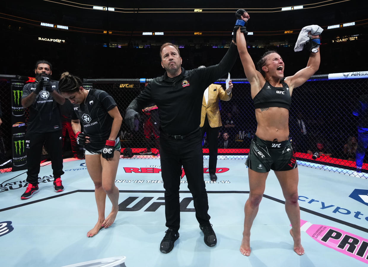 MIAMI, FLORIDA - APRIL 08: Sam Hughes reacts after her victory over Jaqueline Amorim of Brazil in a strawweight fight during the UFC 287 event at Kaseya Center on April 08, 2023 in Miami, Florida. (Photo by Jeff Bottari/Zuffa LLC via Getty Images)