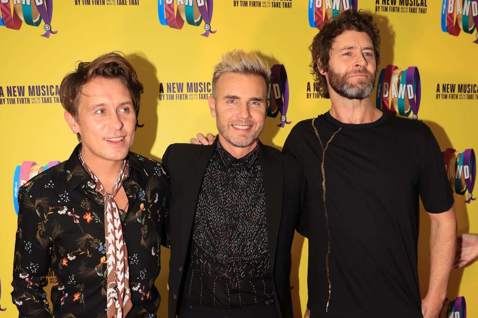 Mark Owen, Gary Barlow, and Howard Donald of Take That (Peter Byrne/PA) (PA Archive)