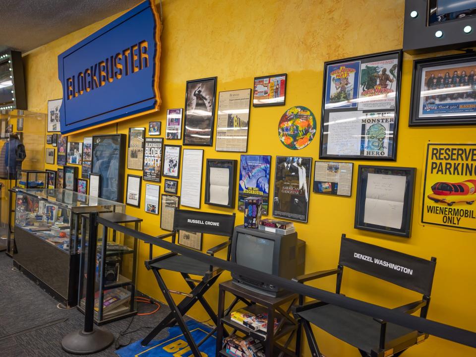 blockbuster museum with frames of posters and director chairs