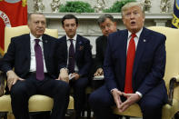 President Donald Trump and Turkish President Recep Tayyip Erdogan meet in the Oval Office with Republican senators at the White House Wednesday, Nov. 13, 2019, in Washington. (AP Photo/Patrick Semansky)