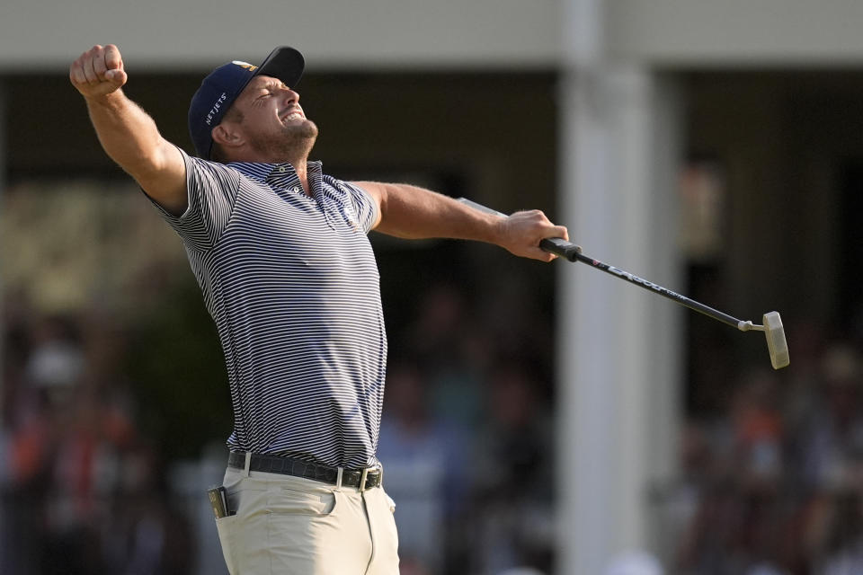 Bryson DeChambeau celebrates after winning the U.S. Open golf tournament Sunday, June 16, 2024, in Pinehurst, N.C. (AP Photo/Mike Stewart)