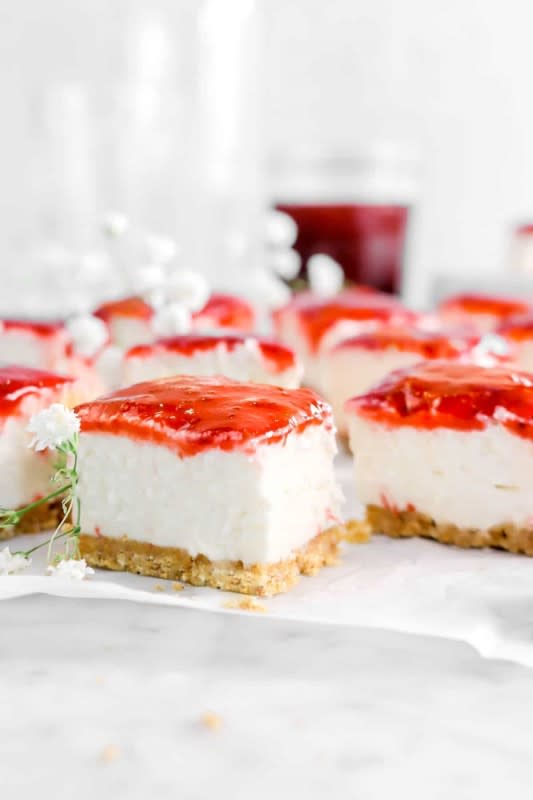 <p>Bakers Table</p><p>Sweet, creamy, tangy, and exploding with flavor! </p><p><strong>Get the recipe: </strong><a href="https://bakerstable.net/no-bake-strawberries-and-cream-cheesecake-bars" rel="nofollow noopener" target="_blank" data-ylk="slk:No-Bake Strawberries and Cream Cheesecake Bars;elm:context_link;itc:0;sec:content-canvas" class="link "><strong>No-Bake Strawberries and Cream Cheesecake Bars</strong></a></p>