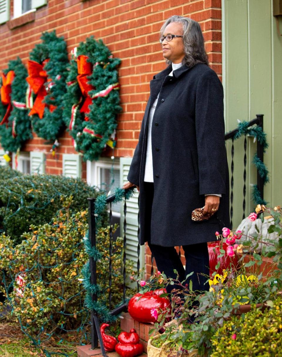 Renee Pride-Dunlap stands for a portrait in front of her home in the historic Oaklawn Park neighborhood in Charlotte, NC on Thursday, December 17, 2020. Pride-Dunlap is leading the effort to make Oaklawn Park a locally designated historic neighborhood.