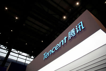 FILE PHOTO: A sign of Tencent is seen during the fourth World Internet Conference in Wuzhen, Zhejiang province, China, Dec. 3, 2017. REUTERS/Aly Song/File Photo