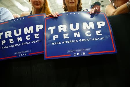 Supporters are seen as Republican U.S. presidential nominee Donald Trump attends a campaign event at Windham High School in Windham, New Hampshire August 6, 2016. REUTERS/Eric Thayer