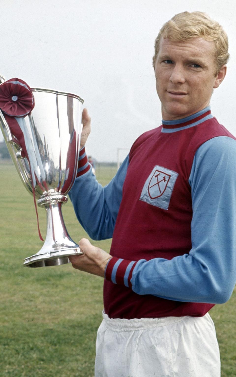 West Ham Captain Bobby Moore shows the European Cup Winners Cup trophy in 1965 - Brian Dear interview: ‘We were mainly from Barking, Dagenham, East Ham’ – West Ham’s European win - Mirrorpix/Malcolm McNeill