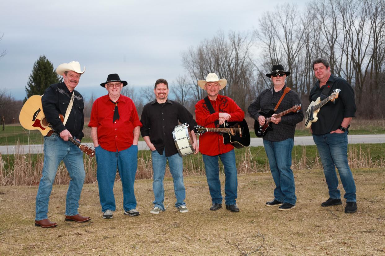 Pictured are Pickin' Roots band members, from left, James Dodd of Onsted on rhythm guitar and vocals, Kevin Fix of Newport on steel guitar, Joe Weyan of Dundee on drums, Larry Rothman of Clinton/Tecumseh on lead vocals, Jeff Pierce of Toledo on lead guitar and Heath Bathgate of Monroe on bass. Pickin' Roots takes the Lenawee County Fair bandshell stage at 7 p.m. Friday.