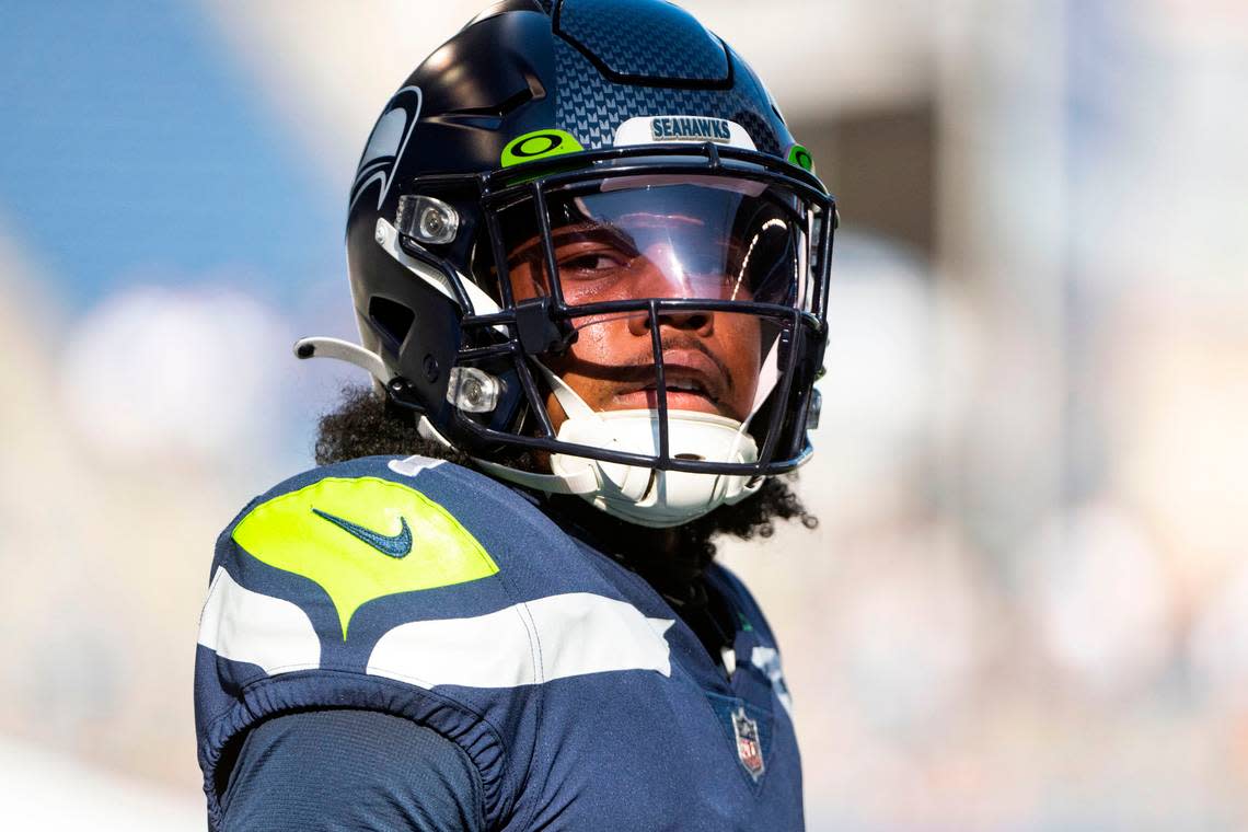 Seattle Seahawks wide receiver Dee Eskridge (1) goes through warmups prior to the start of an NFL game against the Arizona Cardinals on Sunday, Oct. 16, 2022, at Lumen Field in Seattle.