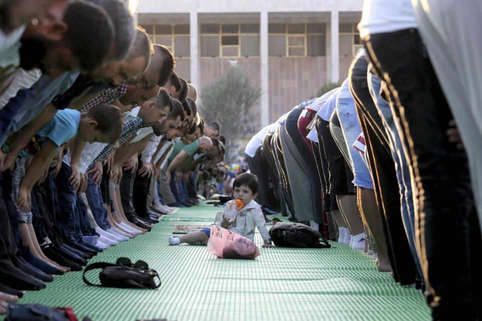 In Albanian capital Tirana, prayers take place on recently renovated Skanderbeg Square (AP / Hektor Pustina)