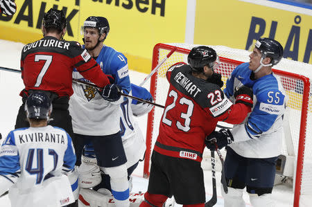 Ice Hockey World Championships - Final - Canada v Finland - Ondrej Nepela Arena, Bratislava, Slovakia - May 26, 2019 Canada's and Finland's players scuffle during the match. REUTERS/Vasily Fedosenko
