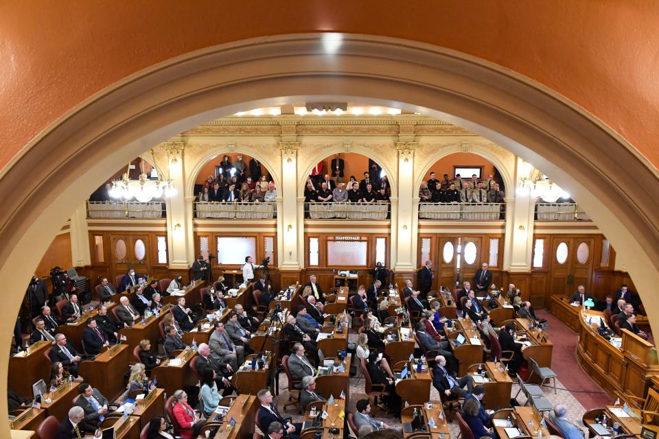 Legislators gather in the House to listen as Governor Kristi Noem gives the State of the State address on Tuesday, January 11, 2022, at the South Dakota State Capitol in Pierre.