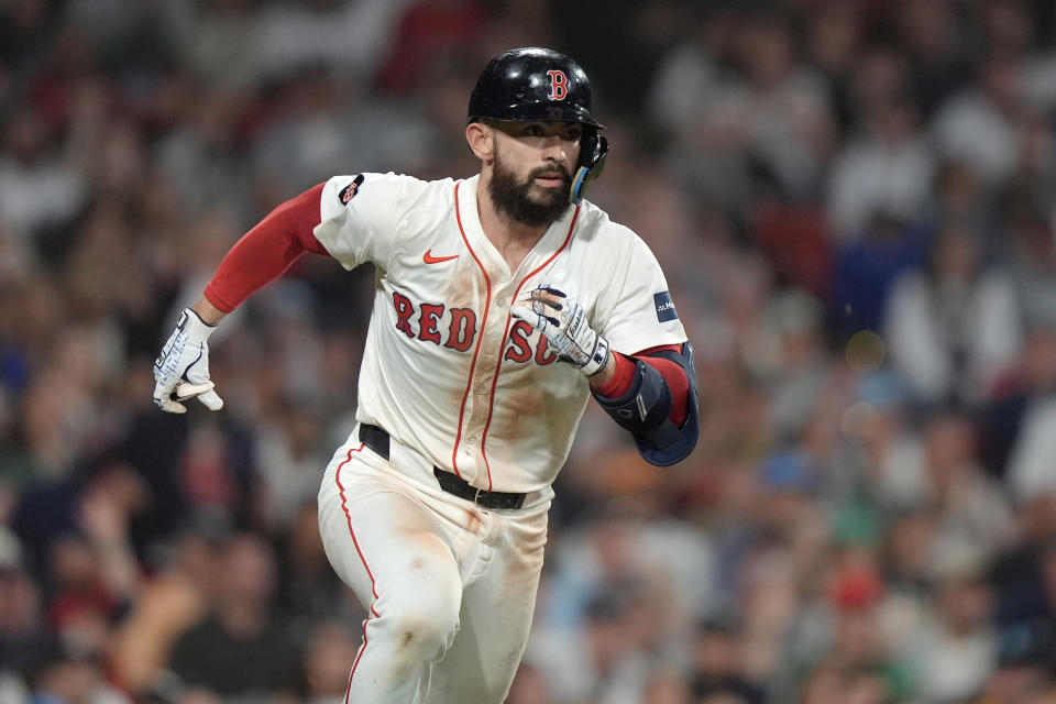 Boston Red Sox's Connor Wong runs after hitting a two-run triple in the seventh inning of a baseball game against the New York Yankees, Sunday, June 16, 2024, in Boston. (AP Photo/Steven Senne)