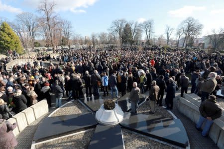 People attend the funeral of Oliver Ivanovic in Belgrade, Serbia, January 18, 2018. REUTERS/Djordje Kojadinovic