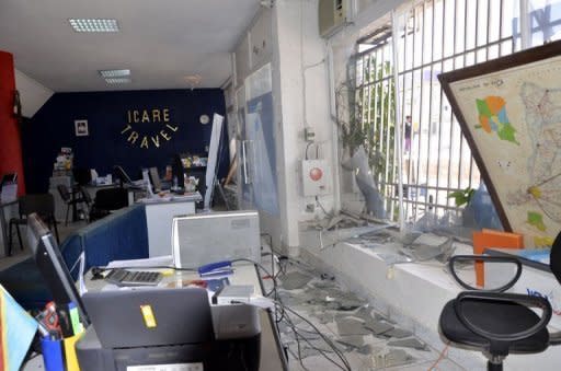 Damage inside a travel agency on Boulevard du 30 Juin in Kinshasa following a series of blasts at a munition depot across the Congo River in the Congolese capital Brazzaville