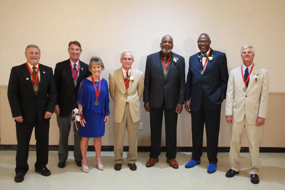 From left, Eddie Aenchbacher, Dale Critz Jr., Sheryl Cohen, Michael Lariscy, Elijah "Sonny" Powell, Marvin Lloyd and Eric Oetgen were honored Monday night, May 16, during the Greater Savannah Athletic Hall of Fame awards banquet at the Alee Temple.