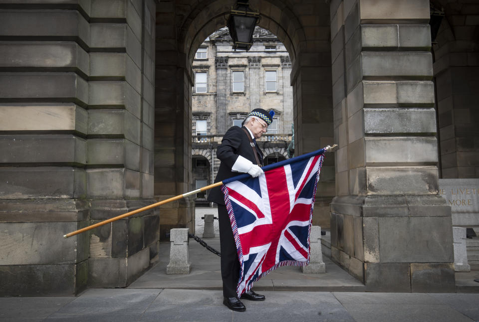 Standard bearer Geoff Williams from Legion Scotland outside Edinburgh City Chambers before the St Valery commemoration to remember the thousands of Scots who were killed or captured during "the forgotten Dunkirk" 80 years ago.