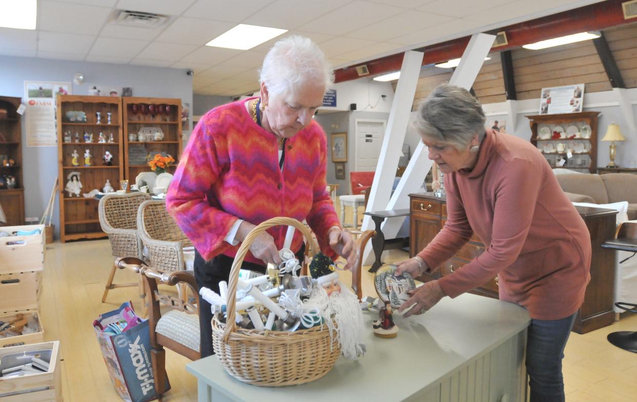 Volunteer Sue Berlandi, right, helps Barbara Jones of Cape Abilities Thrift set out items for sale in the West Yarmouth shop. Cape Abilities Thrift store is located at 316 Route 28. Proceeds from the thrift shop benefit Cape Abilities programs. The shop also provides employment and training for individuals of all abilities and also to promote awareness of the Cape Abilities mission. To see more photos, go to www.capecodtimes.com.