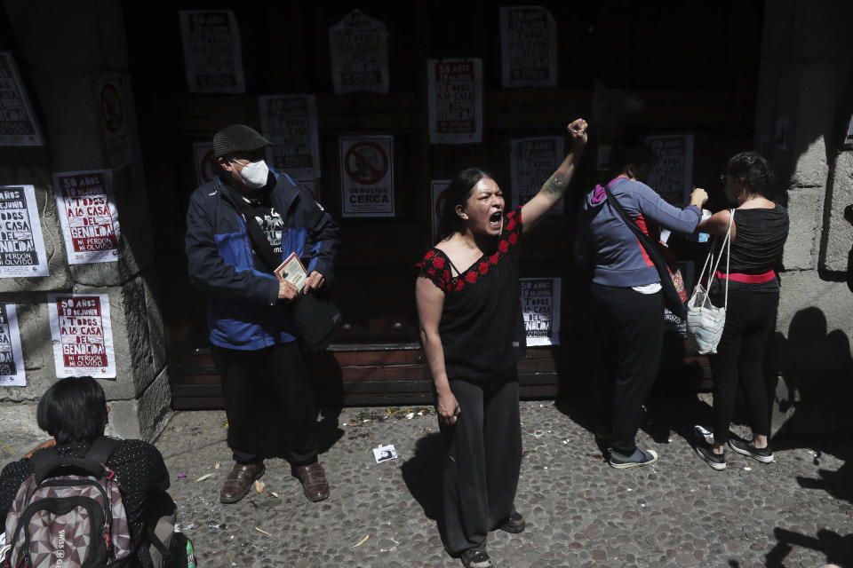 Protesters gather outside the residence of former Mexican President Luis Echeverría, (1970-1976), during a march to commemorate the 50th anniversary of the student massacre of 1971 known as "El Halconazo," in Mexico City, Thursday, June 10, 2021. The attack, also known as the Corpus Christi massacre, was carried out by a group of men apparently recruited by the government to dissolve a pro-democracy student demonstration. (AP Photo/Marco Ugarte)